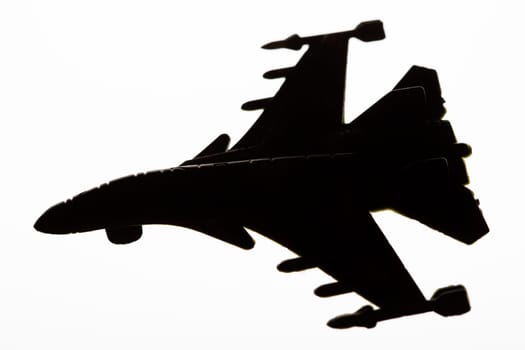 Jet fighter airplane silhouette isolated on white background.