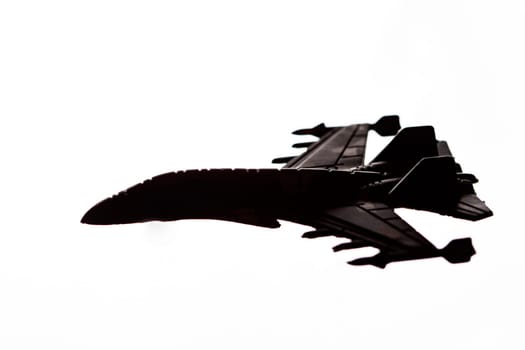 Jet fighter airplane silhouette isolated on white background.