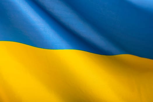 Flag of Ukraine. Blue and yellow colors. Close up shot, background