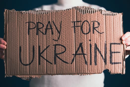 Pray for Ukraine concept background. Concept symbol of help support and no war in the country of Ukraine.