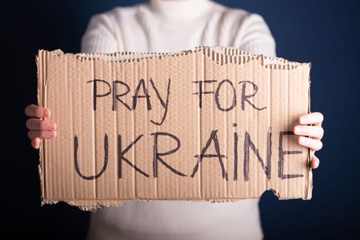 Pray for Ukraine concept background. Concept symbol of help support and no war in the country of Ukraine.