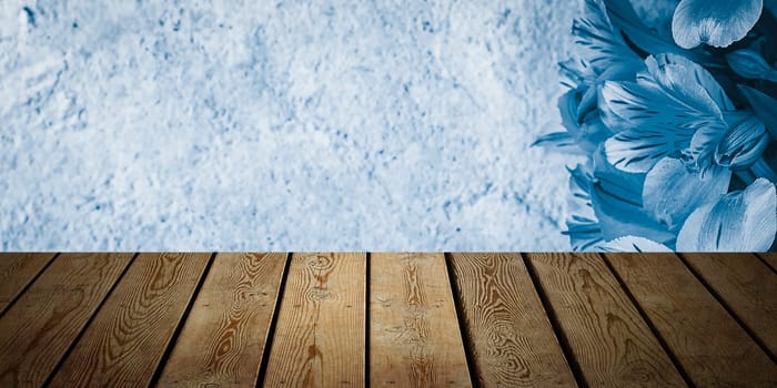 Background flowers on a textured stucco wall and blank wooden planks in the foreground. For product demonstrations, free space, layout, mockup, perspective board, background board.