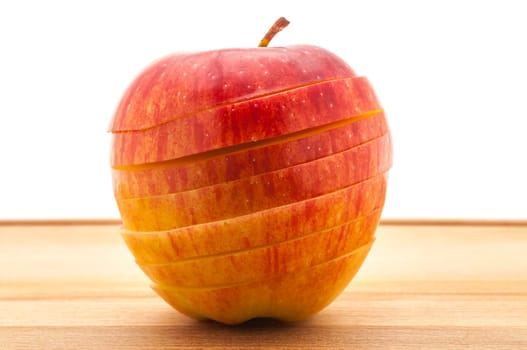 Close-up A delicious juicy apple for baking cut across on a table.