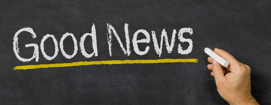 Text written on a blackboard - Good news