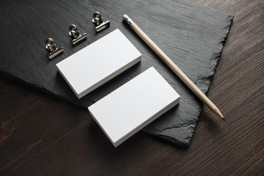 Blank business cards, pencil and clips. Template for graphic designers portfolios.