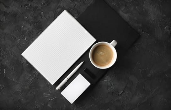 Branding stationery mockup on black plaster background. Blank objects for placing your design. Flat lay.