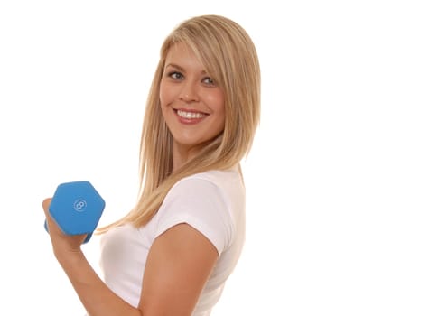 Lovely blond girl working out with weights
