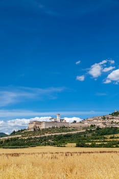 Assisi village in Umbria region, Italy. The town is famous for the most important Italian St. Francis Basilica (Basilica di San Francesco)