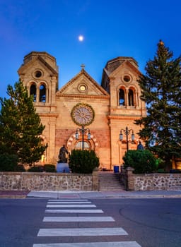 Nighttime view of the Cathedral Basilica of St. Francis of Assisi in Santa Fe, New Mexico