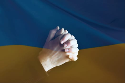 Pray for Ukraine concept background. National Ukrainian flag. Concept symbol of help support and no war in the country of Ukraine.