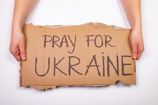 Pray for Ukraine concept background. Concept symbol of help support and no war in the country of Ukraine.