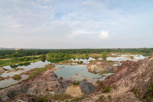 Abandoned quarry in morning view from top of hill