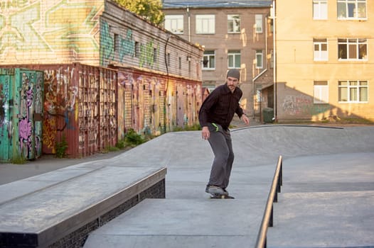 a skateboarder rides a skateboard in a skatepark. High quality photo