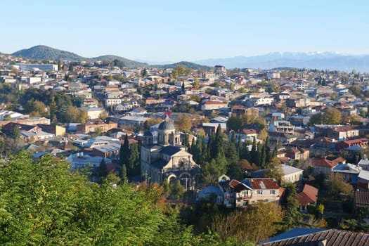 A view of a city with a mountain in the backgroundundefined
