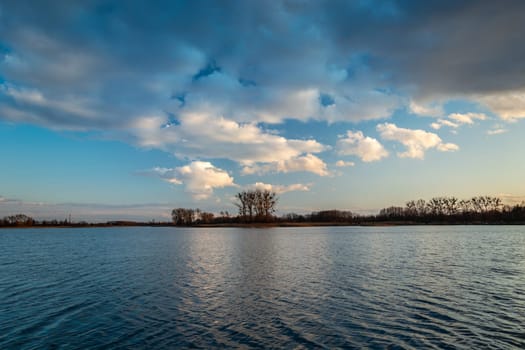 Evening clouds over a calm lake, Stankow, Lubelskie, Poland