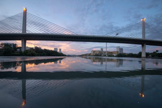 Seberang Perai, Penang, Malaysia - Circa Jun 2018: Reflection of Prai River Bridge in dusk hour