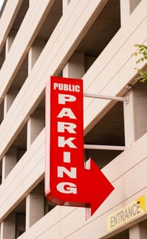 A highrise parking garage advertises for you downtown