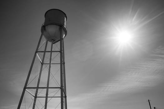 The sun creates a starburst on a warm spring day in the country