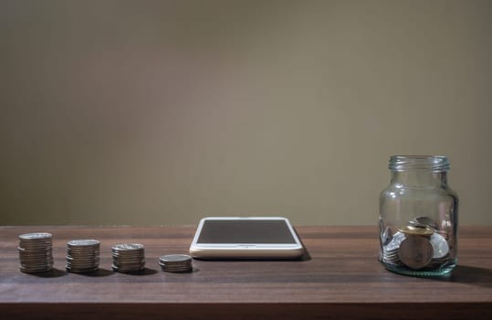 Save money and account banking for finance, Online banking and internet banking and networking people concept, Business man with laptop and coin money