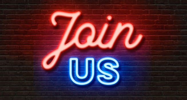 Neon sign on a brick wall - Join us