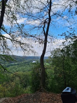 Biker couple riding mountain bike in the forest at countryside