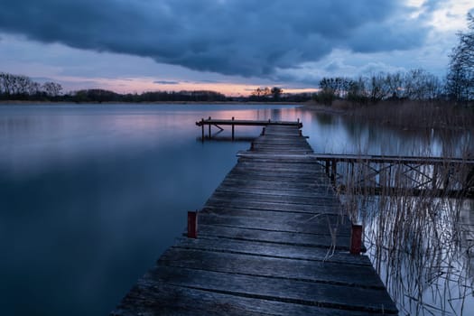 A wooden pier on a water reservoir in Stankow, Lubelskie, Poland