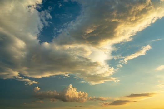 Fantastic clouds highlighted by the sun, spring view