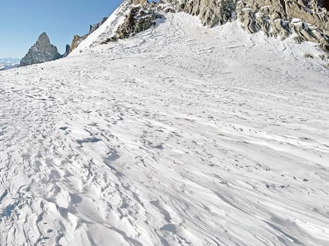 Monte Blanc glacier from Pointe Helbronner, a station along the Skyway Monte Bianco, Courmayeur town, Italy. Skyway Monte Bianco is a cable car in the italian Alps, linking the town of Courmayeur with Pointe Helbronner on the southern side of the Mont Blanc massif