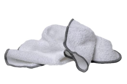Household cleanliness and hygiene. Close-up of a white cleaning cloth isolated on a white background. Microfiber cleaning cloth. Macro.