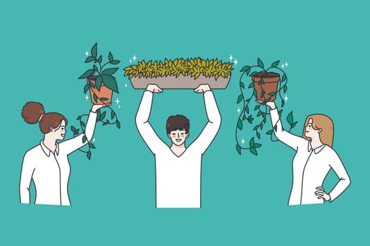 Smiling employees hold plants decorate office with greenery. Happy businesspeople with green flowers enjoy gardening making workplace cozy and comfortable. Flat vector illustration.