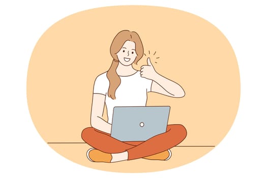 Thumbs up and Freelance concept. Smiling young woman sitting with laptop in hands working as freelancer having remote job showing thumbs up sign with fingers vector illustration