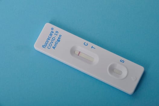 covid-19 self-test on a blue background