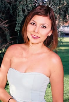 A lovely model female model posing outdoors