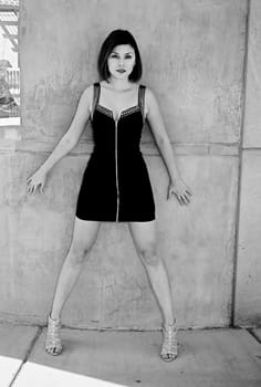 A lovely model female model posing outdoors