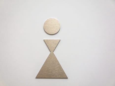 Modern abstract Lady symbol on toilet door