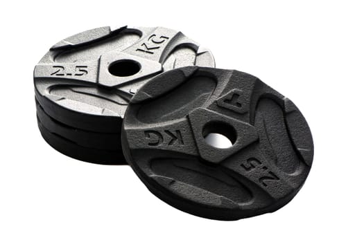 Four black metal pancakes of 2.5 kg each lie on a white isolated background. High quality photo