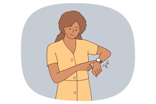 Smiling woman look at smartwatch on hand. Happy African American girl check time on smart watch on wrist. Modern technology concept. Flat vector illustration, cartoon character.