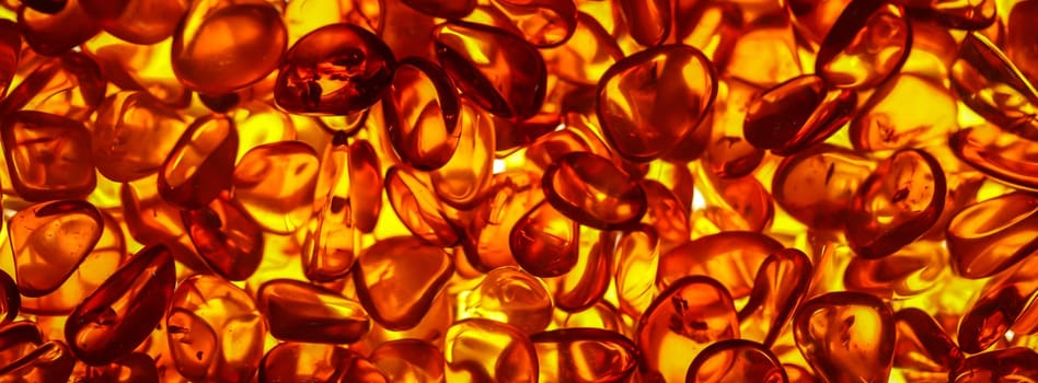 Amber in its natural form and warm color. Amber is often made into jewelry.