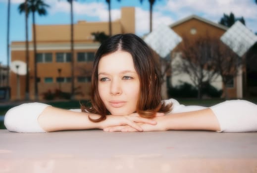 Soft focus of a lovely model female model posing outdoors