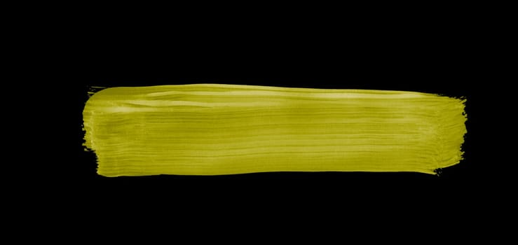 Yellow paintbrush stripe on black background