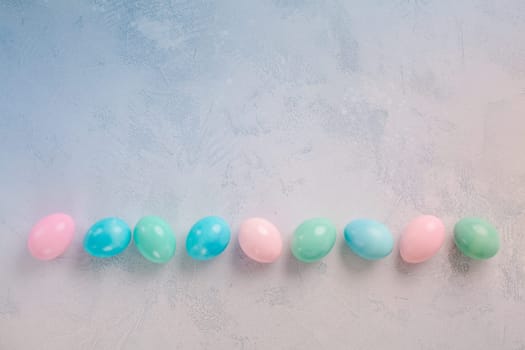 Row of Easter eggs in row with copy space