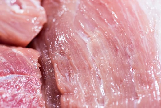 Closeup top view piece fresh raw meat of pork