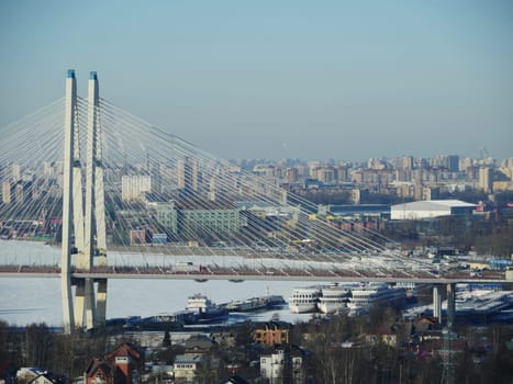 Big cable-stayed bridge view from above on St. Petersburg in winter