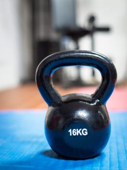 16 kg kettlebell at a gym. Weight lifting concept.