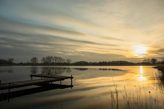 Sunset with cool clouds over the lake, Stankow, Poland