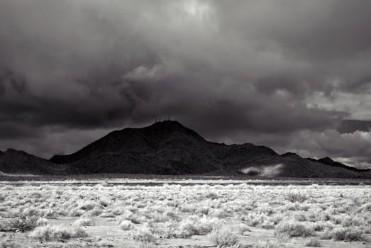 Desert storm over the southwestern desert and mountains .