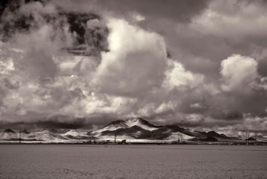 Desert storm over the southwestern desert and mountains .