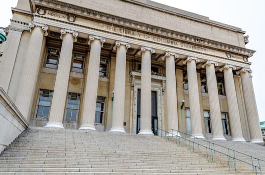 The Library of Columbia University view from low angle, no people, staircase in front of the Building, New York City, during winter day with overcast, horizontal