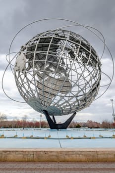 Unisphere close-up at Flushing-Meadows-Park, Queens, New York City during overcast winter day, vertical