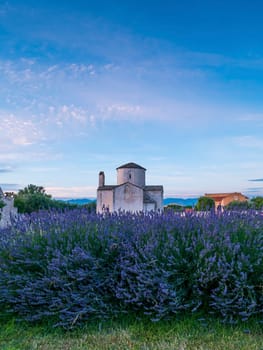 The Church of the Holy Cross, the smallest cathedral in the world, Nin, Croatia..Lavender field in front.